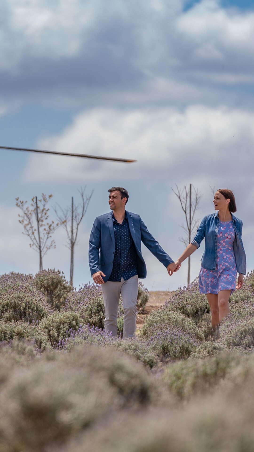 Guests walking through lavender near the Bekaa Air helicopter.