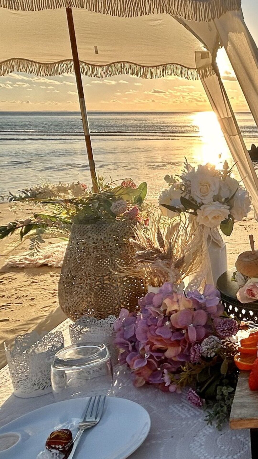 Signature picnic set at the beach in golden light.