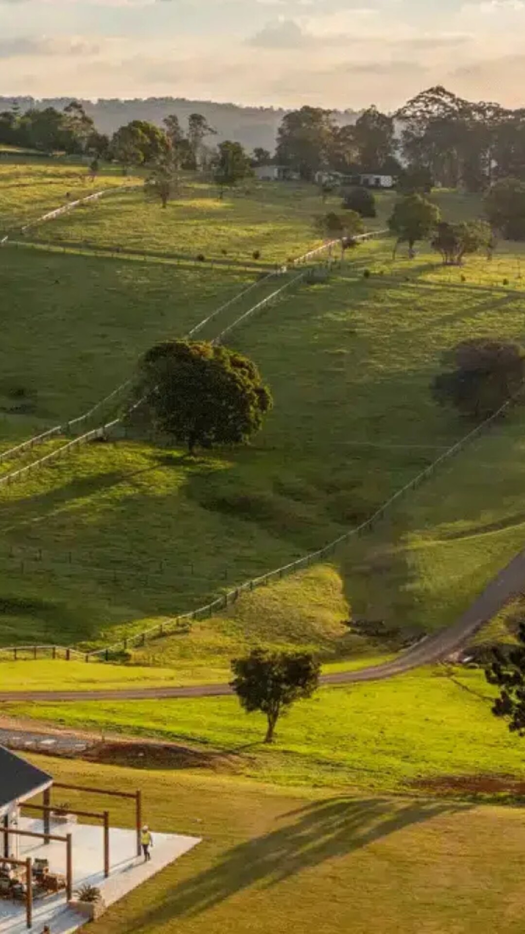 Golden-hour view across Beechmont Estate accommodation and restaurant.