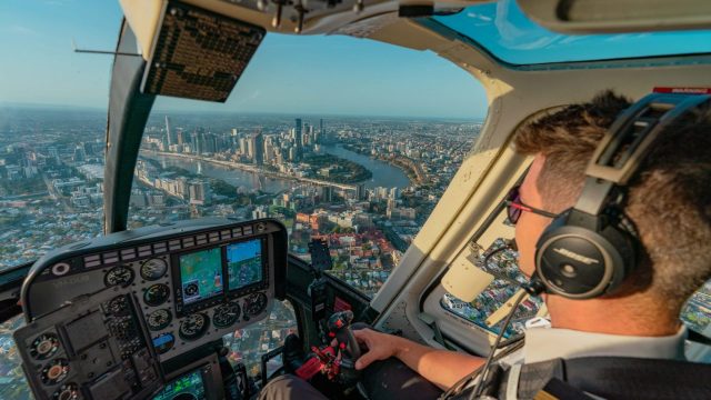 Brisbane City through cockpit of Bell Longrager Helicopter