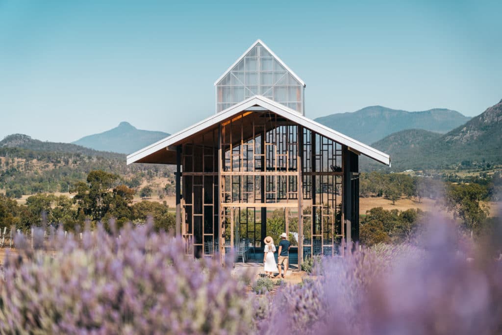 Kooroomba Lavender Farm chapel framed by lavender and mountain views.