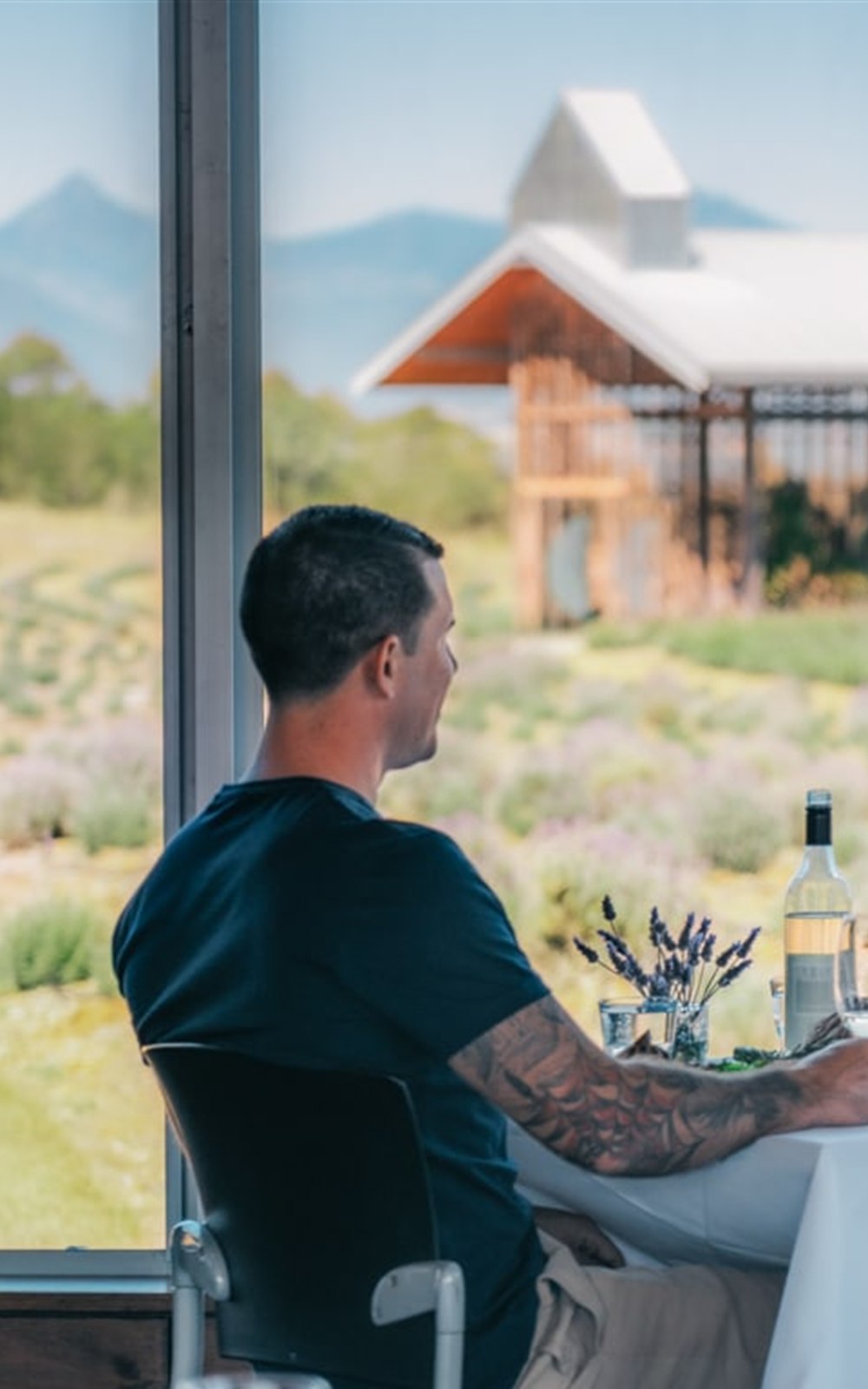 Guests dining with views across Kooroomba Lavender Farm.