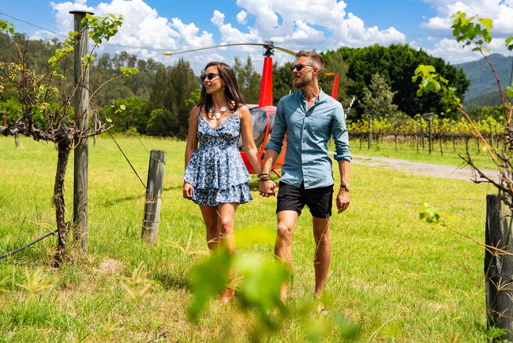Couple enjoying the signature helicopter winery tour.