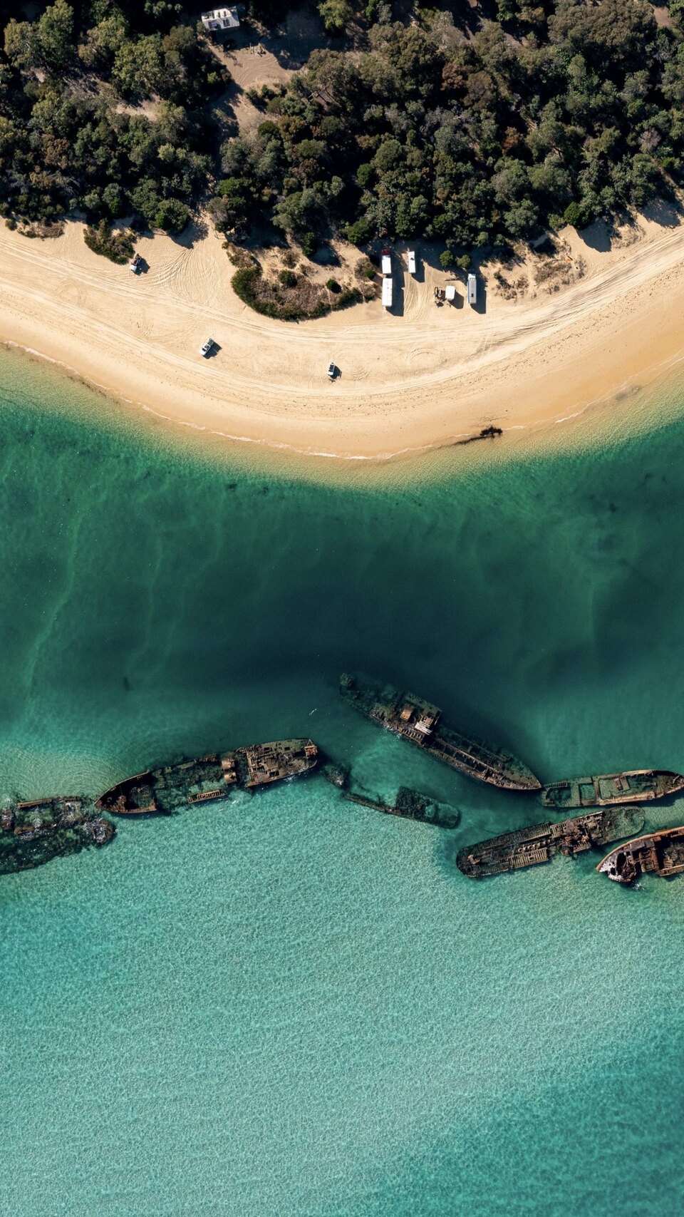 Aerial view of the Tangalooma shipwrecks and Moreton Island beach