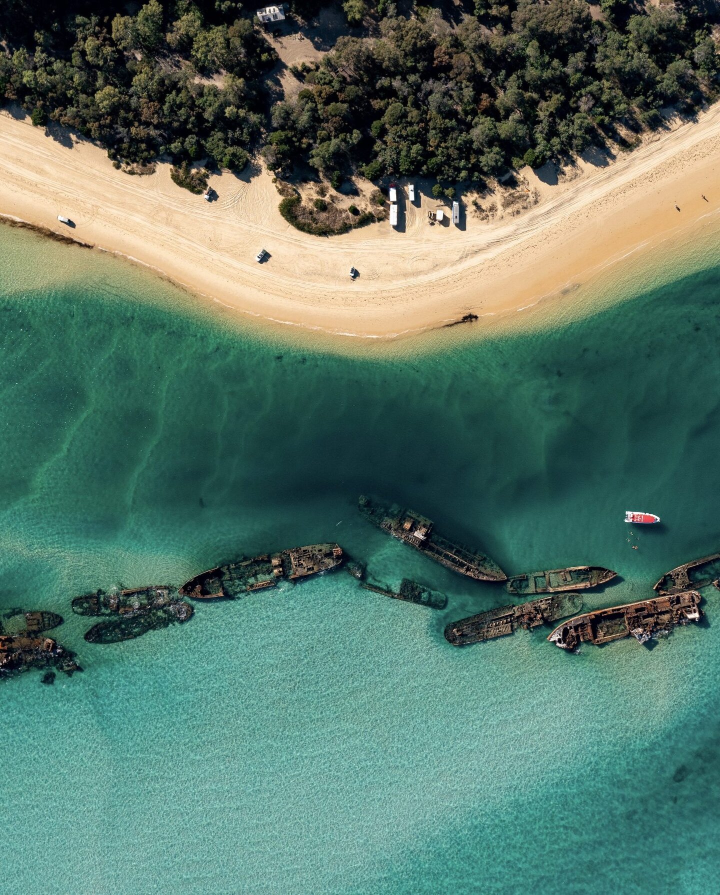 Aerial view of the Tangalooma shipwrecks and Moreton Island beach