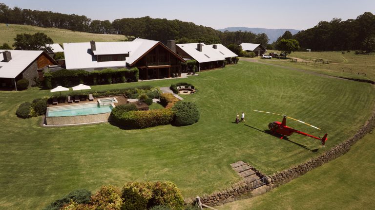 Bekaa Air helicopter on the lawn at Spicers Peak Lodge