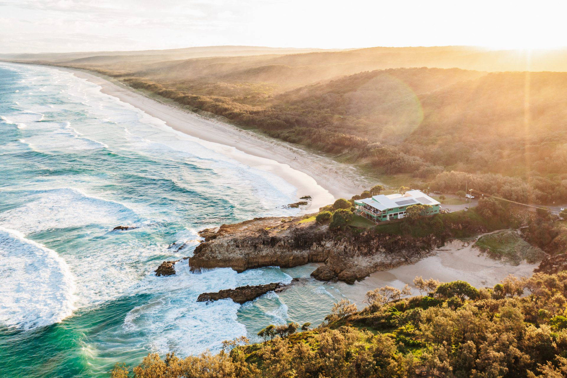 North Stradbroke Island beach and rocky coast from above.