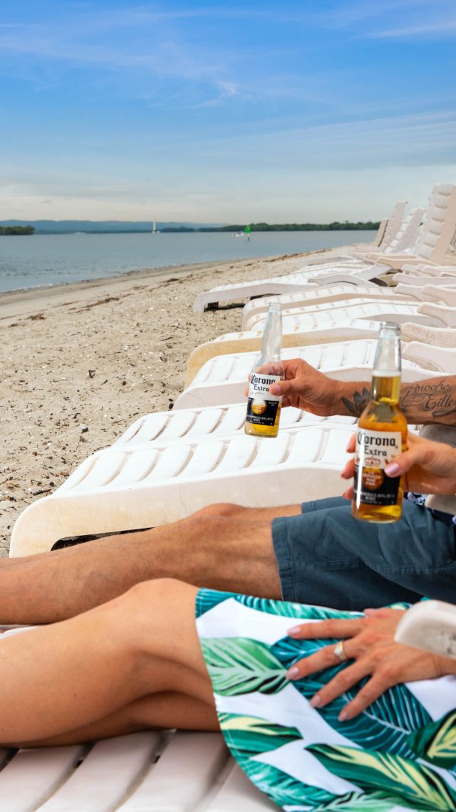 Wine and Stein guests relaxing near the water.