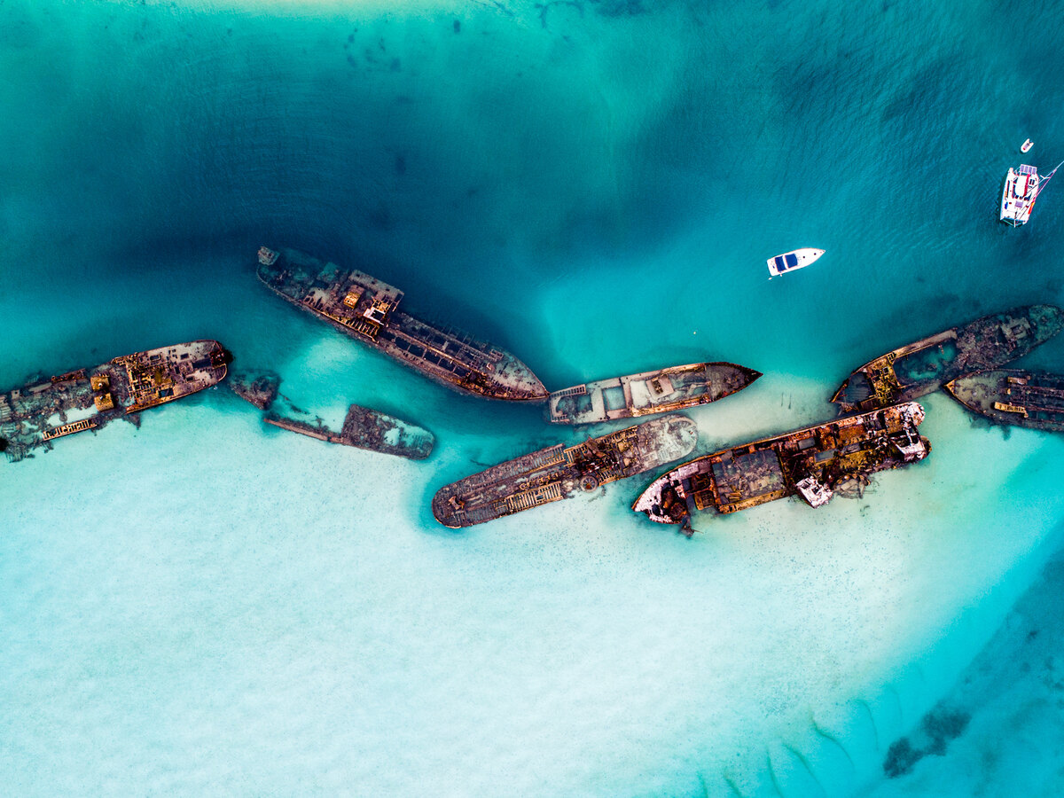Tangalooma Wrecks in turquoise water.
