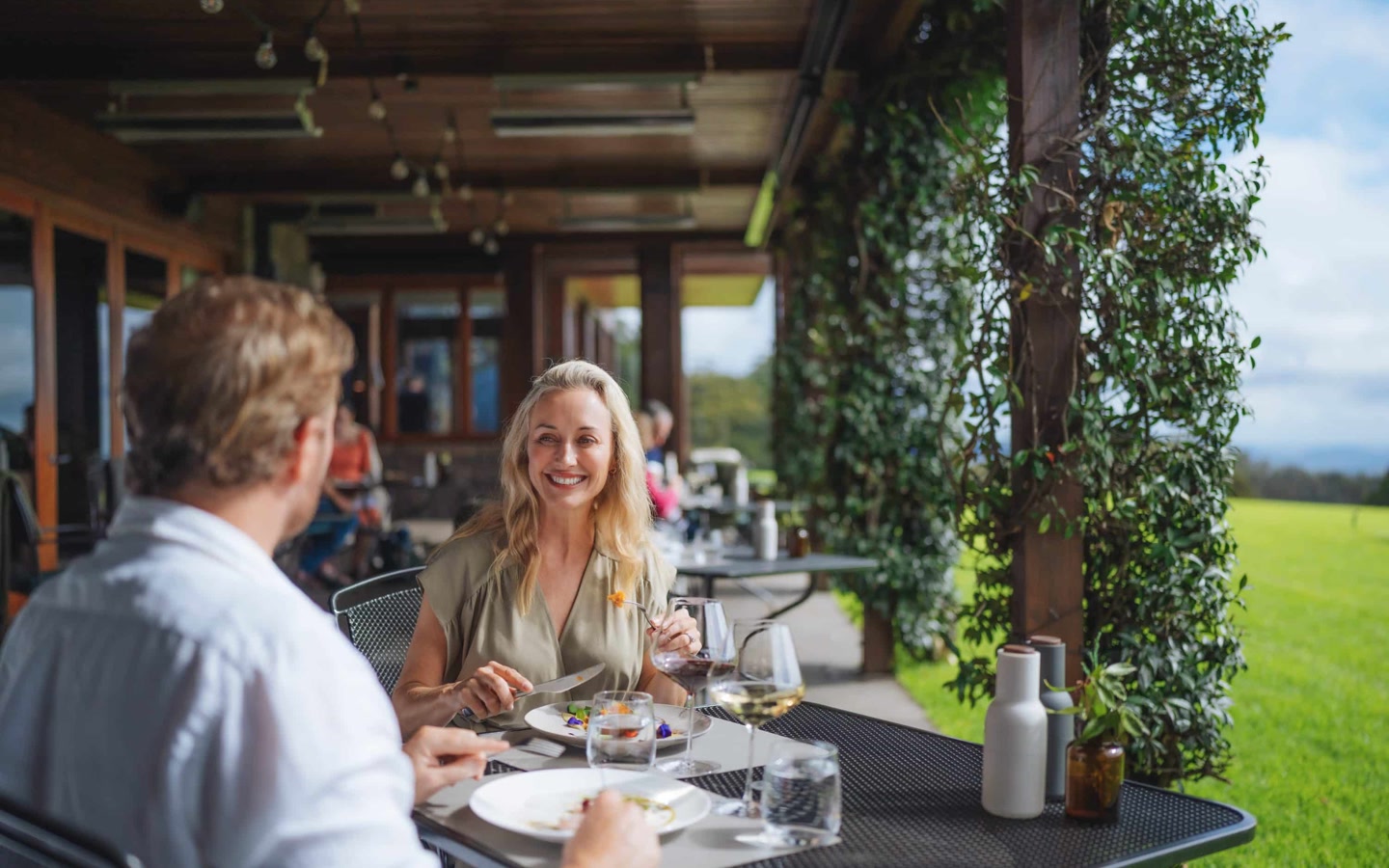 Couple dining inside Spicers Peak Lodge.