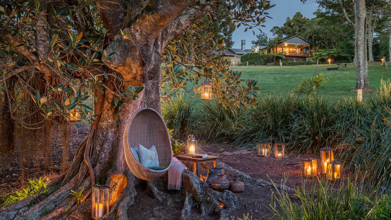 Lantern-lit garden chair at Spicers Tamarind.