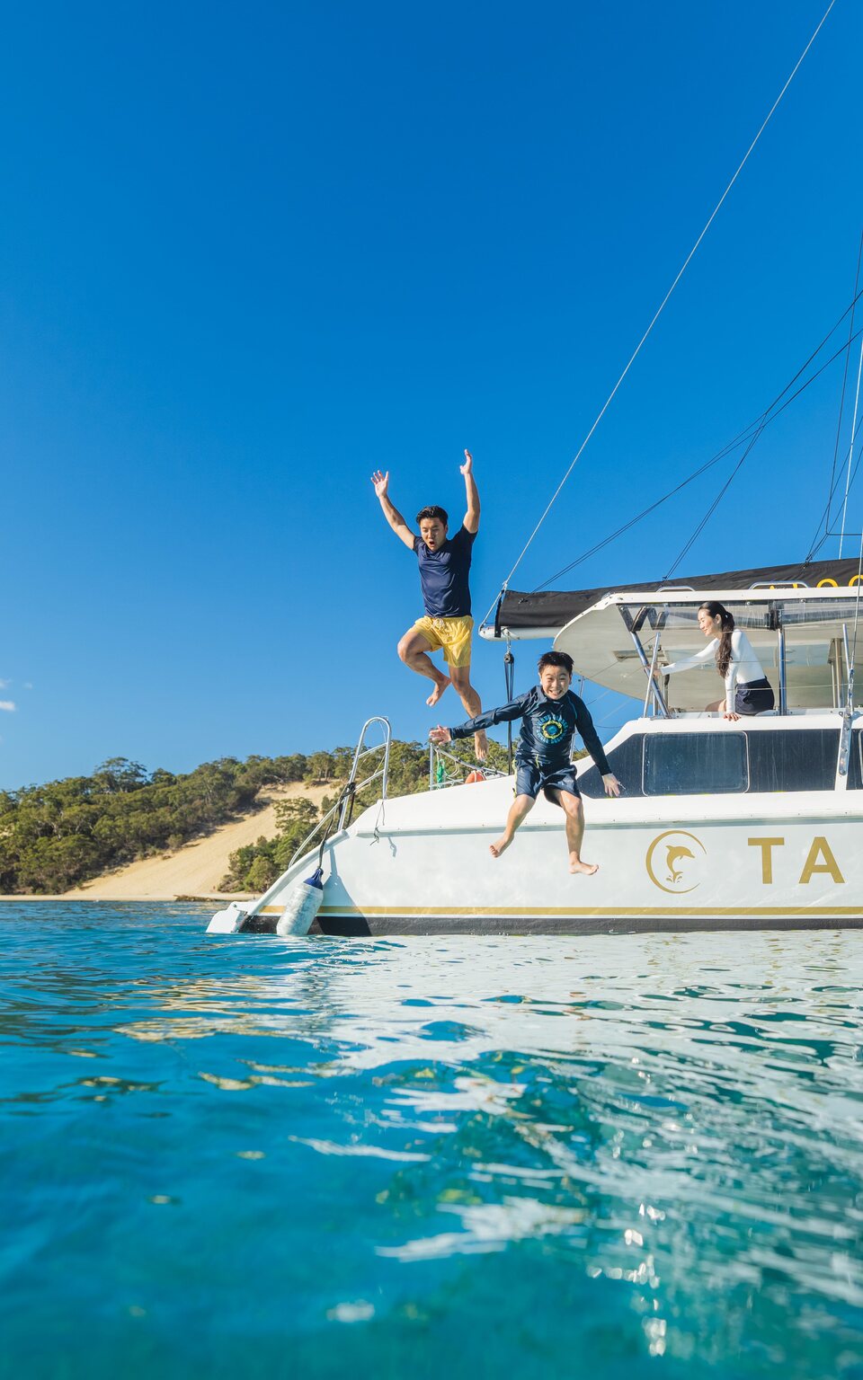 Guests enjoying a boat outing in the clear water off Tangalooma.