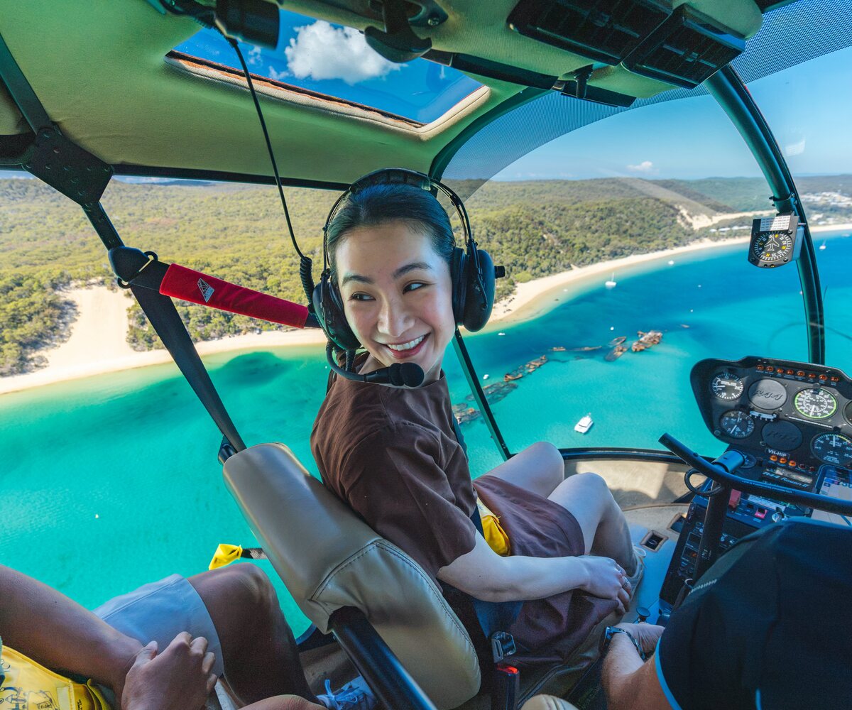 Helicopter passenger overlooking Tangalooma beach and the wrecks.